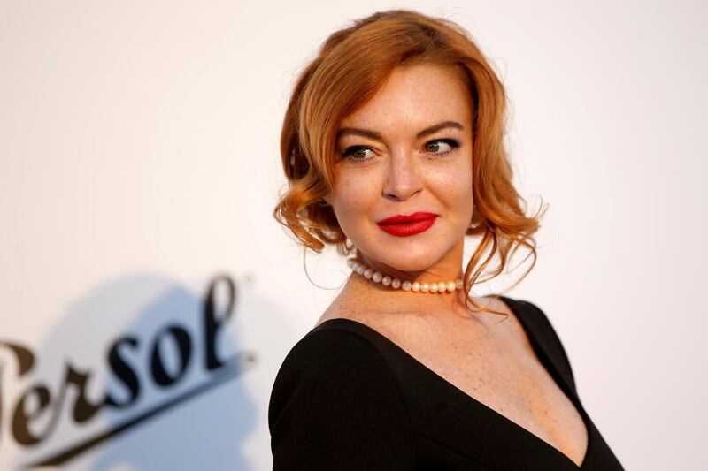 FILE PHOTO: 70th Cannes Film Festival – The amfAR's Cinema Against AIDS 2017 event – Photocall Arrivals - Antibes, France. 25/05/2017. Lindsay Lohan poses.    REUTERS/Stephane Mahe/File Photo