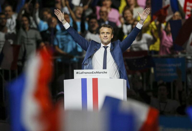 Emmanuel Macron, head of the French political movement En Marche and candidate for the 2017 presidential election, reacts after delivering a speech during a campaign rally in Lyon, France, on February 4, 2017. Robert Pratta / Reuters