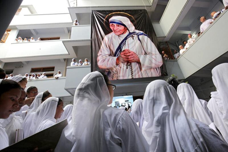 Nuns take part in a prayer during a mass marking Mother Teresa's 19th death anniversary at the Missionaries of Charity in Calcutta.  Piyal Adhikary / EPA