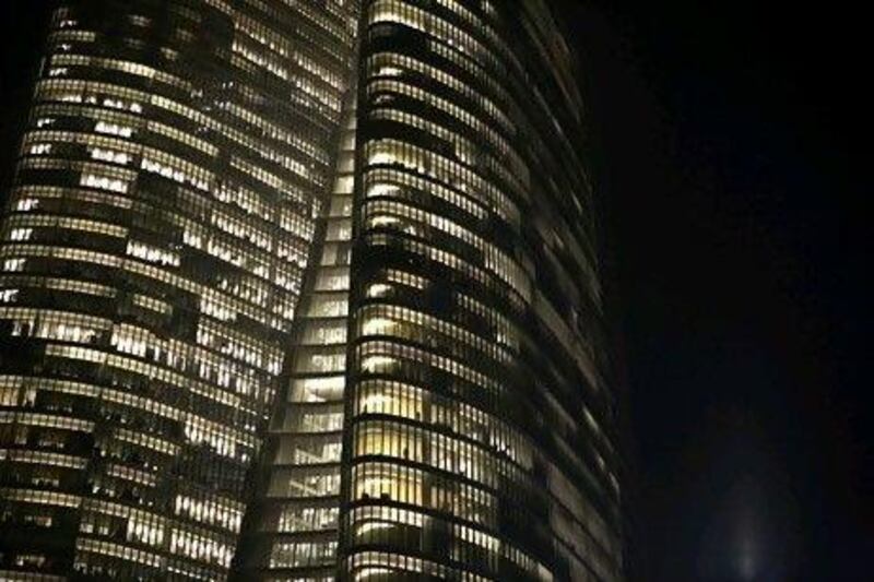 The Adia building at night. Adia is working on streamlining its operations. The National