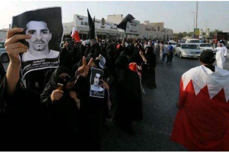 Mourners demonstrate after the burial of Majeed Ahmed Mohammed in Sehla, Bahrain, earlier this month, four months after he went missing at the height of pro-reform protests. Mazen Mahdi / EPA
