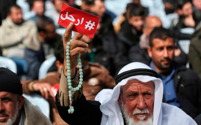 Palestinian demonstrators attend a protest, in Gaza City, demanding Palestinian president Mahmoud Abbas to step down. AFP