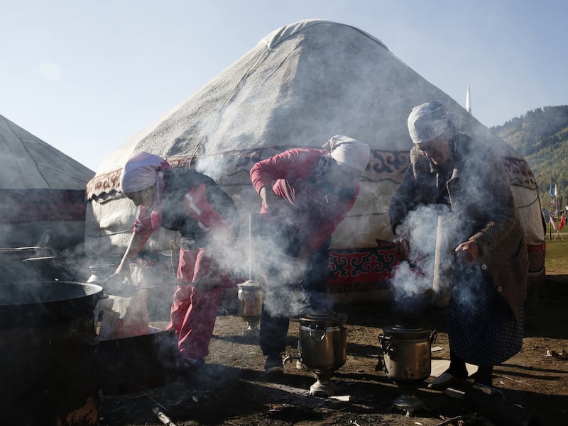 4. Bed down in a cosy yurt during a winter escape to Kyrgyzstan. Olivia Harris / Getty Images