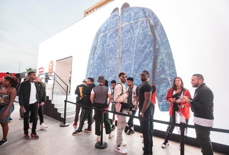 Dubai, United Arab Emirates-  Visitors waiting in queue for entertainment inside a brand house at the Sole Dubai Festival at D3.  Leslie Pableo for The National for Saeed Saeed's story
