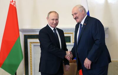 Russian President Vladimir Putin, left, and Belarus President Alexander Lukashenko during their meeting in St Petersburg. EPA