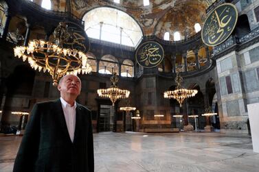 Turkey's President Recep Tayyip Erdogan visits the Byzantine-era Hagia Sophia, one of Istanbul's main tourist attractions in the historic Sultanahmet district of Istanbul, Sunday, July 19, 2020. Turkish Presidency via AP