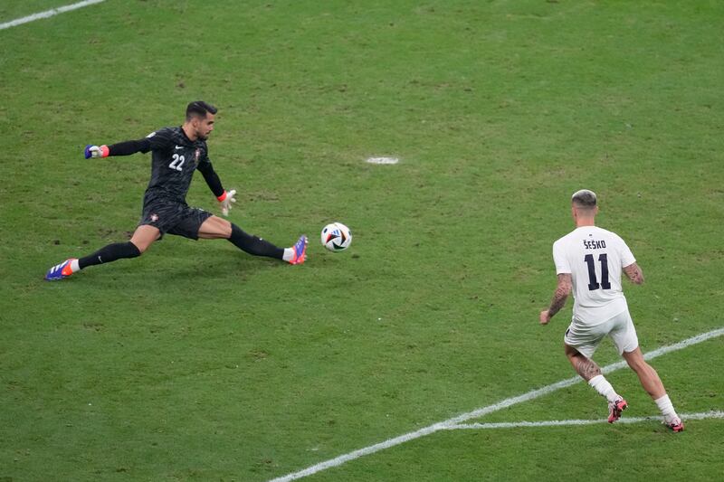 Portugal's goalkeeper Diogo Costa saves from Benjamin Sesko in extra time. AP 