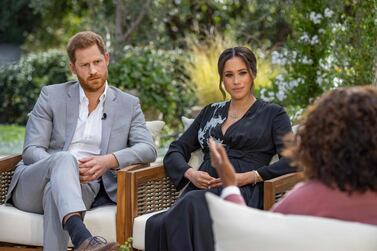 Britain's Prince Harry and his wife Meghan Markle, Duchess of Sussex, in conversation with US television host Oprah Winfrey. AFP 