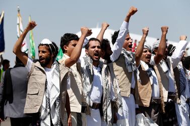 Exchanged Yemeni prisoners loyal to the Houthis shout slogans upon their arrival at Sanaa airport on the second day of a prisoner exchange between the Yemeni government and the Houthis, in Sanaa. EPA