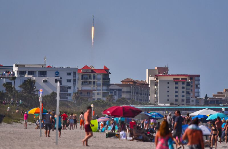 The rocket flies over Cocoa Beach and Cape Canaveral. AP