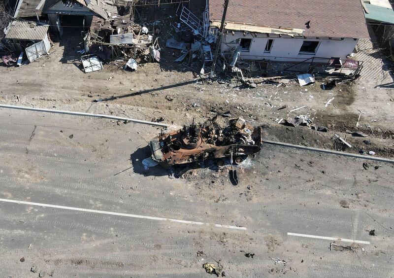 A charred Russian armoured personnel carrier on the front line in the Kyiv region. Reuters