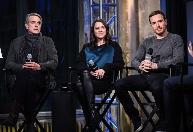 From left, Jeremy Irons, Marion Cotillard and Michael Fassbender of Assassin’s Creed. Photo by Daniel Zuchnik / WireImage / Getty Images