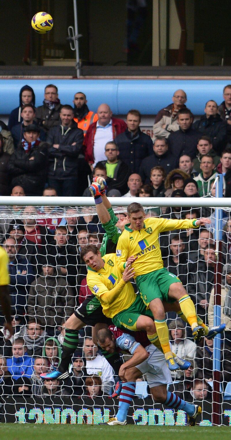 Aston Villa's US goalkeeper Brad Guzan clears the ball during the English Premier League football match between Aston Villa and Norwich City at Villa Park in Birmingham, West Midlands, England on October 27, 2012. The game ended 1-1. AFP PHOTO/CARL COURT

RESTRICTED TO EDITORIAL USE. No use with unauthorized audio, video, data, fixture lists, club/league logos or “live” services. Online in-match use limited to 45 images, no video emulation. No use in betting, games or single club/league/player publications.
 *** Local Caption ***  764932-01-08.jpg