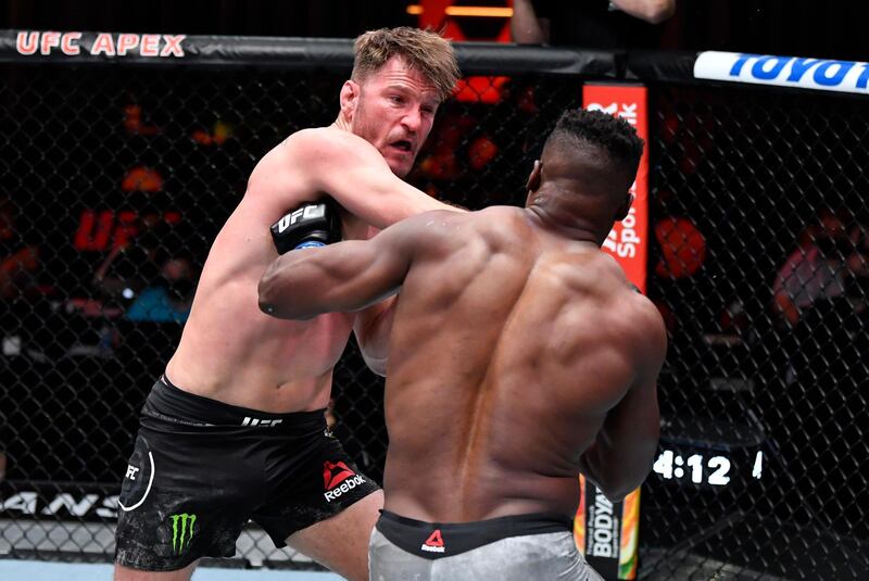 Stipe Miocic punches Francis Ngannou in their UFC heavyweight championship fight. Jeff Bottari / USA TODAY Sports / Reuters