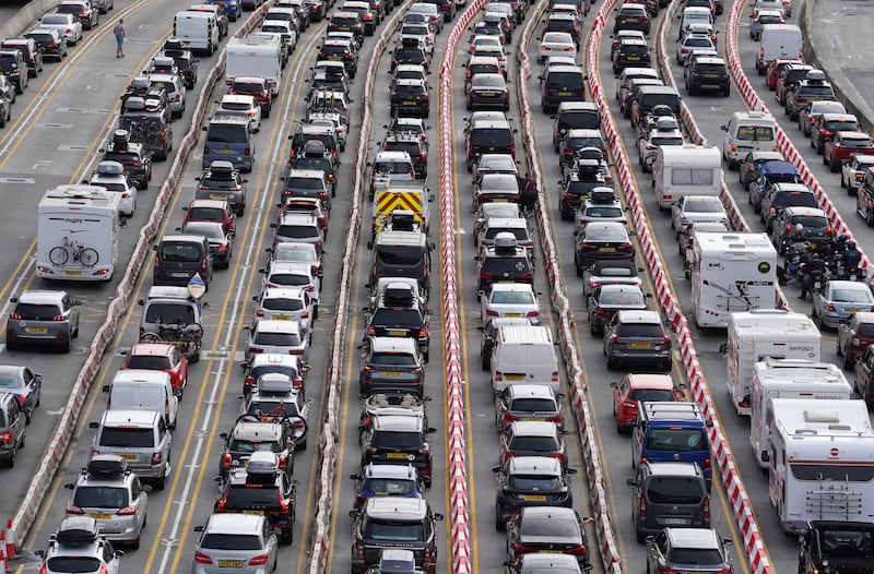 Cars form long queues at the check-in at the Port of Dover in Kent. PA