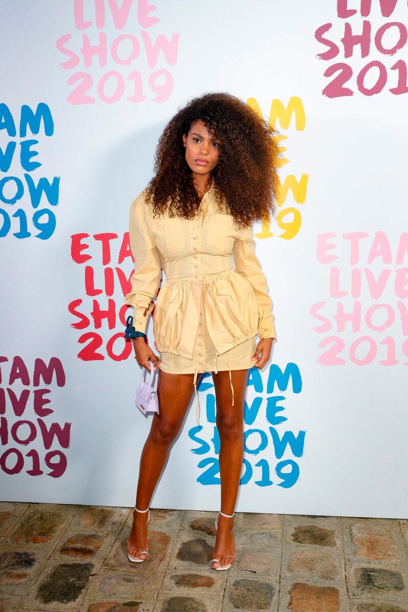 Tina Kunakey Cassel arrives for the Etam show during Paris Fashion Week on September 24, 2019. AFP