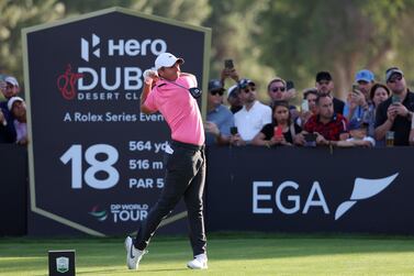 DUBAI, UNITED ARAB EMIRATES - JANUARY 29: Rory McIlroy of Northern Ireland tees off on the 18th hole during the Third Round on Day Four of the Hero Dubai Desert Classic at Emirates Golf Club on January 29, 2023 in Dubai, United Arab Emirates. (Photo by Warren Little / Getty Images)