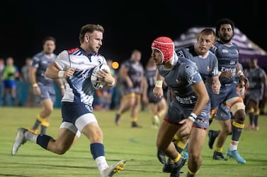 Brad Janes of Jebel Ali Dragons with the ball at the UAE Premiership, Dubai Hurricanes v Jebel Ali Dragons at Al Ain Amblers Club.  Ruel Pableo for The National