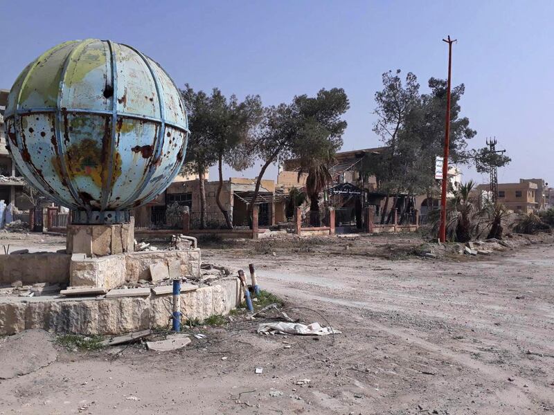 A view of a damaged square and buildings in the town of Al-Mohammadiyeh, east of the capital Damascus, as Syrian government forces push into the rebel-held eastern Ghouta enclave. AFP