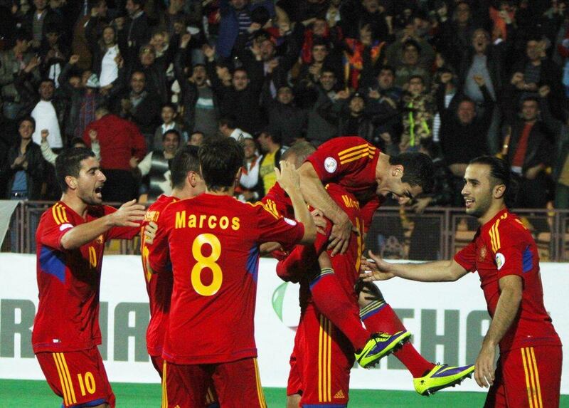 Armenia 2-1 Bulgaria. Armenia can still reach the play-off in Group B after drawing within a point of second-place Bulgaria. Hrant Khachatryan / AP