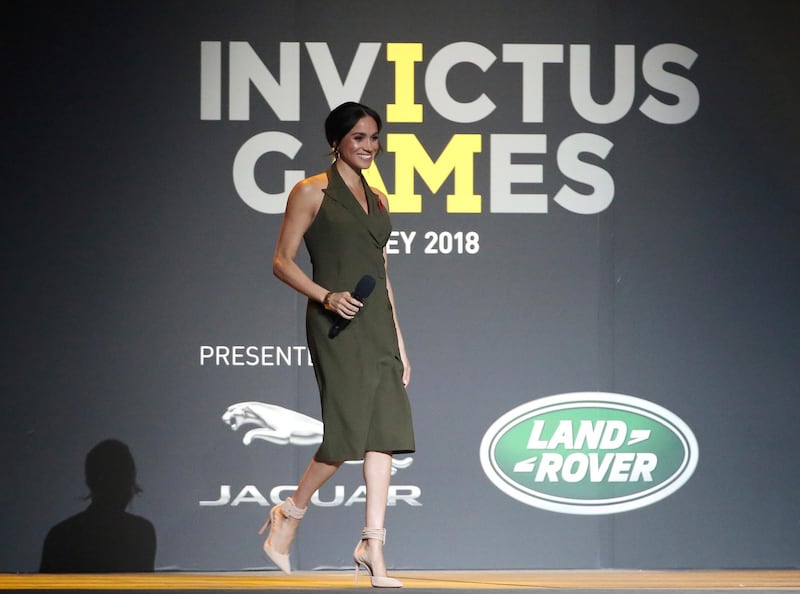 Meghan, Duchess of Sussex, wears Antonio Berardi and Aquazzura heels at the Invictus Games in Sydney, on October 27, 2018. AP