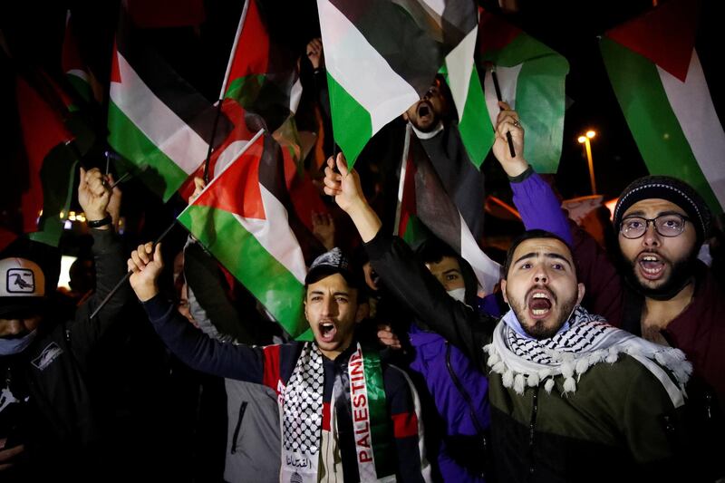 Pro-Palestinian demonstrators shout slogans during a protest against Israel near the Israeli Consulate in Istanbul, Turkey. Reuters