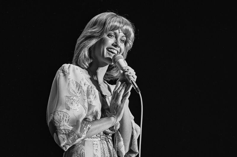 Newton-John beat out Dolly Parton and Loretta Lynn for best country singer at the Country Music Awards in 1974. Las News Bureau / EPA