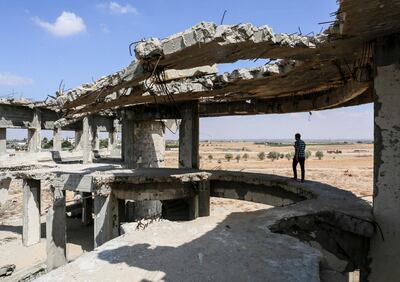 This picture taken on September 9, 2018 shows a view of the destroyed and deserted terminal of the Gaza Strip's former "Yasser Arafat International Airport", in the Palestinian enclave's southern city of Rafah. - When the Palestinian government inaugurated its first airport with US president Bill Clinton in attendance, it was a symbol of the hopes for independence and peace created by the Oslo accords. But 25 years after the first of those historic agreements was signed on September 13, 1993, the airport in Gaza lies in tatters, along with Palestinian hopes for an independent state. (Photo by SAID KHATIB / AFP)