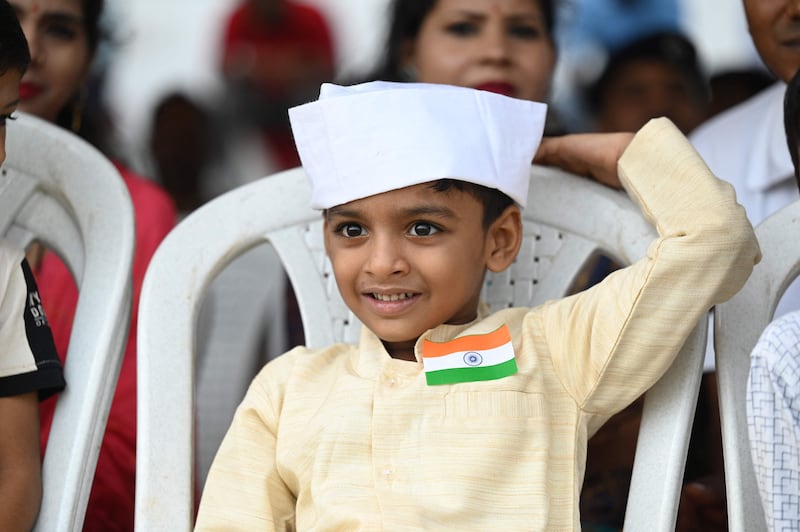 A boy watches watches the parade in Chennai. AFP