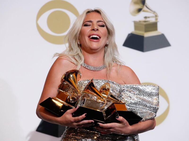 Lady Gaga celebrating her triple win for  Best Song Written for Visual Media and Best Pop Duo/Group Performance for 'Shallow' and her Best Pop Solo Performance for 'Joanne (Where do You Think You're Goin?).' Reuters