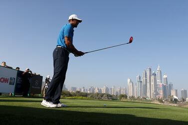 DUBAI , UNITED ARAB EMIRATES Ð Jan 29 , 2014 : Tiger Woods playing during the PRO - AM Omega Dubai Desert Classic golf tournament at Emirates Golf Club in Dubai. ( Pawan Singh / The National ) For Sports. Story by John McAuley
