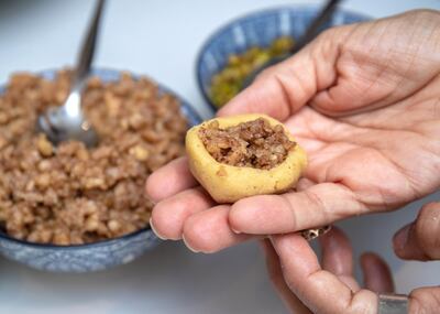 Abu Dhabi, United Arab Emirates, May 2, 2021. Ramadan Recipes by Nihaya.
Traditional Ma'amoul with walnuts, pistachios and dates.
Victor Besa / The National.
Section:  AC