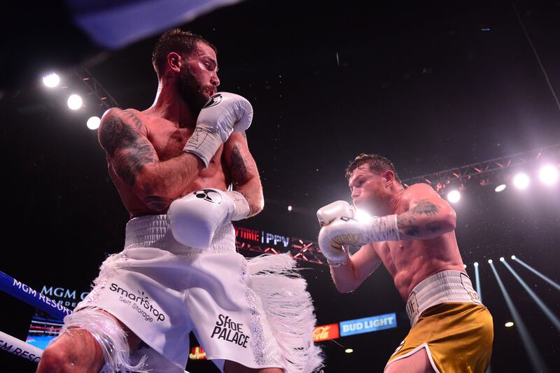 Canelo Alvarez and Caleb Plant box during their undisputed super middleweight world championship boxing match at MGM Grand Garden Arena. Reuters