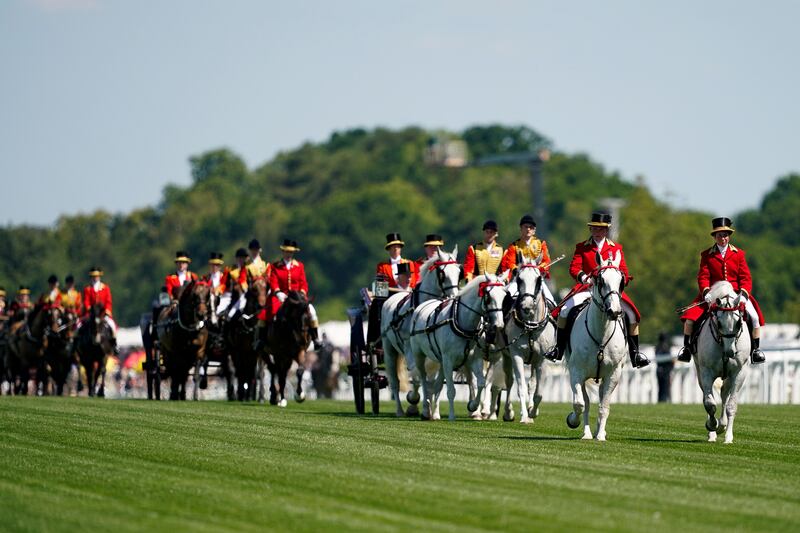 The royal procession makes its way down the course. Getty Images