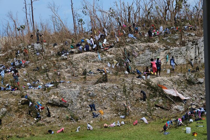 Displaced Haitian nationals take refuge on the grounds of the Government complex in the aftermath of Hurricane Dorian on the Great Abaco island town of Marsh Harbour, Bahamas, September.  Reuters