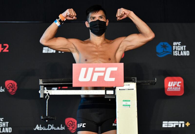 ABU DHABI, UNITED ARAB EMIRATES - JANUARY 19: Tyson Nam poses on the scale during the UFC weigh-in at Etihad Arena on UFC Fight Island on January 19, 2021 in Abu Dhabi, United Arab Emirates. (Photo by Jeff Bottari/Zuffa LLC) *** Local Caption *** ABU DHABI, UNITED ARAB EMIRATES - JANUARY 19: Tyson Nam poses on the scale during the UFC weigh-in at Etihad Arena on UFC Fight Island on January 19, 2021 in Abu Dhabi, United Arab Emirates. (Photo by Jeff Bottari/Zuffa LLC)