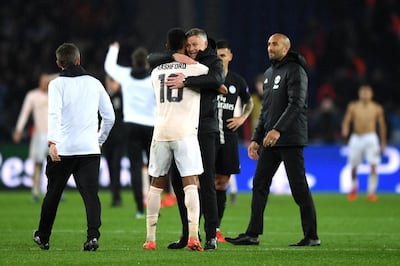 PARIS, FRANCE - MARCH 06:  Ole Gunnar Solskjaer, Manager of Manchester United celebrates victory with Marcus Rashford during the UEFA Champions League Round of 16 Second Leg match between Paris Saint-Germain and Manchester United at Parc des Princes on March 06, 2019 in Paris, . (Photo by Shaun Botterill/Getty Images)