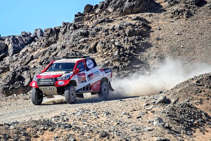 Fernando Alonso gives a souped-up Hilux a tryout at the Dakar Rally. EPA