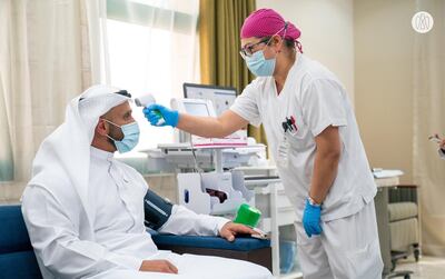 Sheikh Abdullah bin Mohammed Al Hamed, chairman of Department of Health Abu Dhabi, participates in phase III of the clinical trial for the Covid-19 inactivated vaccine in Abu Dhabi. Courtesy: Abu Dhabi Government Media Office