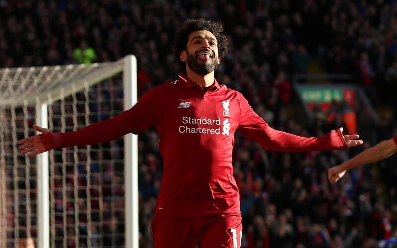 Mohamed Salah celebrates giving Liverpool the lead against Cardiff. Reuters