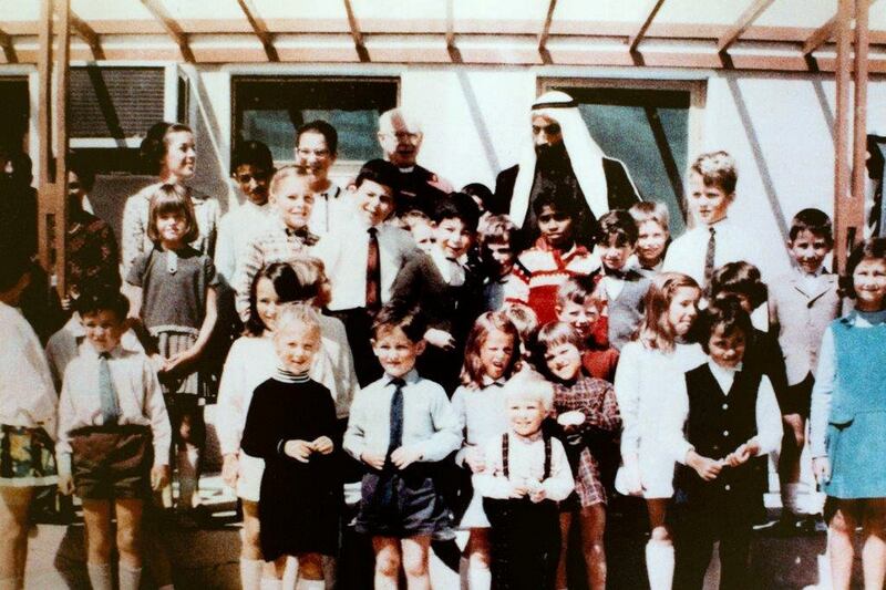 Sheikh Zayed visits the school in the 1970s. Mr Lamb's daughter, Kathryn, is on the far right in a blue dress. Photo: The British School Al Khubairat