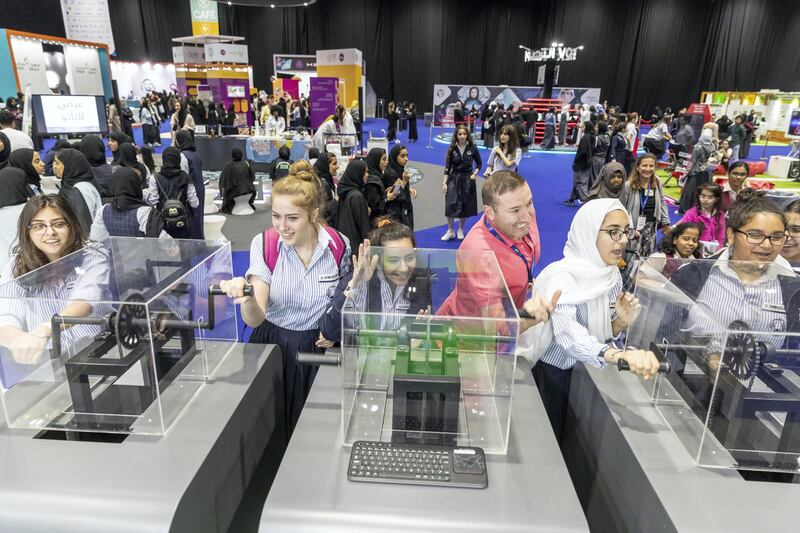 DUBAI, UNITED ARAB EMIRATES. 17 APRIL 2018. STANDALONE from the Think Science fair. Students power hand generators to produce electricity. (Photo: Antonie Robertson/The National) Journalist: None. Section: National.