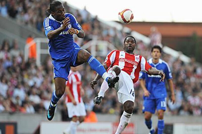 Stoke's Salif Diao, right, and Chelsea's Didier Drogba, in September's league game.