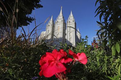 FILE - This Oct. 4, 2019, file photo, shows the Salt Lake Temple at Temple Square in Salt Lake City. For the first time in more than 60 years, top leaders from The Church of Jesus Christ of Latter-day Saints will deliver speeches at the faith's signature conference this weekend without anyone watching in the latest illustration of how the coronavirus pandemic is altering worship practices around the world. The twice-yearly conference normally brings some 100,000 people to the church conference center in Salt Lake City to watch five sessions over two days. This event, though, will be only a virtual one. (AP Photo/Rick Bowmer, File)