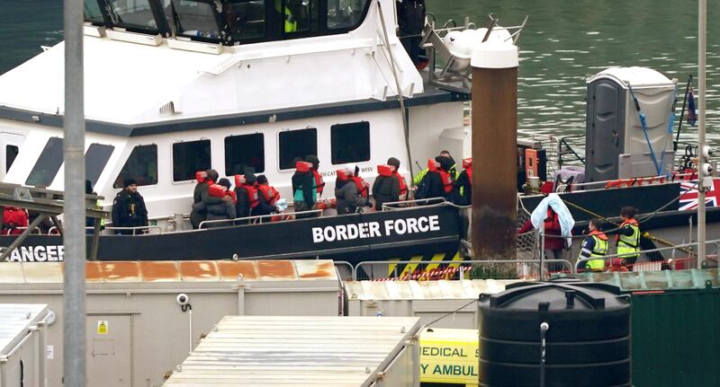A group of people thought to be migrants are brought in, onboard a Border Force vessel, after a small boat incident on the Channel last week. AP