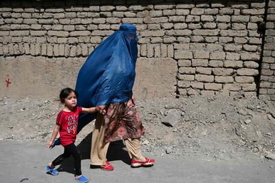 A woman with her child in Kabul. When conflicts run out of heat, chronic instability follows, as in Afghanistan, South Sudan or the Congo. AFP