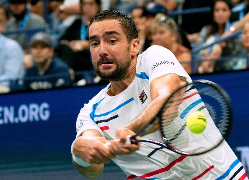 Marin Cilic of Croatia hits a return to Rafael Nadal of Spain during their Round Four Men's Singles match at the 2019 US Open at the USTA Billie Jean King National Tennis Center in New York.  AFP