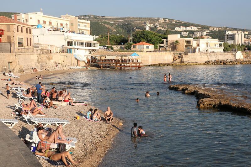 Beachgoers enjoy the sun in Batroun, a city with a population of about 45,000 in north Lebanon. Reuters