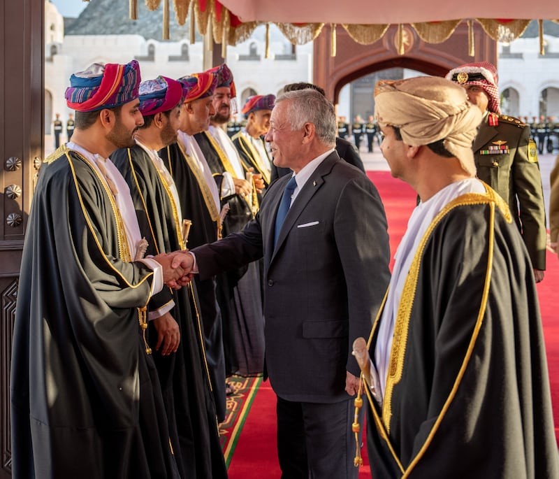 Jordan's King Abdullah II greets dignitaries upon his arrival in Oman. Photo: Oman News Agency