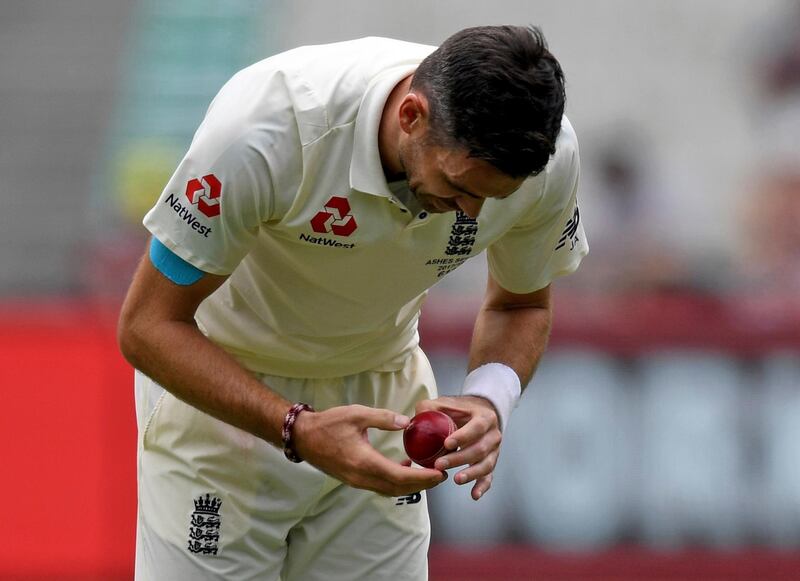 epa06408632 James Anderson of England inspects the ball on Day Four of the Boxing Day test match between Australia and England at the Melbourne Cricket Ground (MCG) in Melbourne, Victoria, Australia, 29 December 2017.  EPA/JOE CASTRO -- EDITORIAL USE ONLY, IMAGES TO BE USED FOR NEWS REPORTING PURPOSES ONLY, NO COMMERCIAL USE WHATSOEVER, NO USE IN BOOKS WITHOUT PRIOR WRITTEN CONSENT FROM AAP -- AUSTRALIA AND NEW ZEALAND OUT